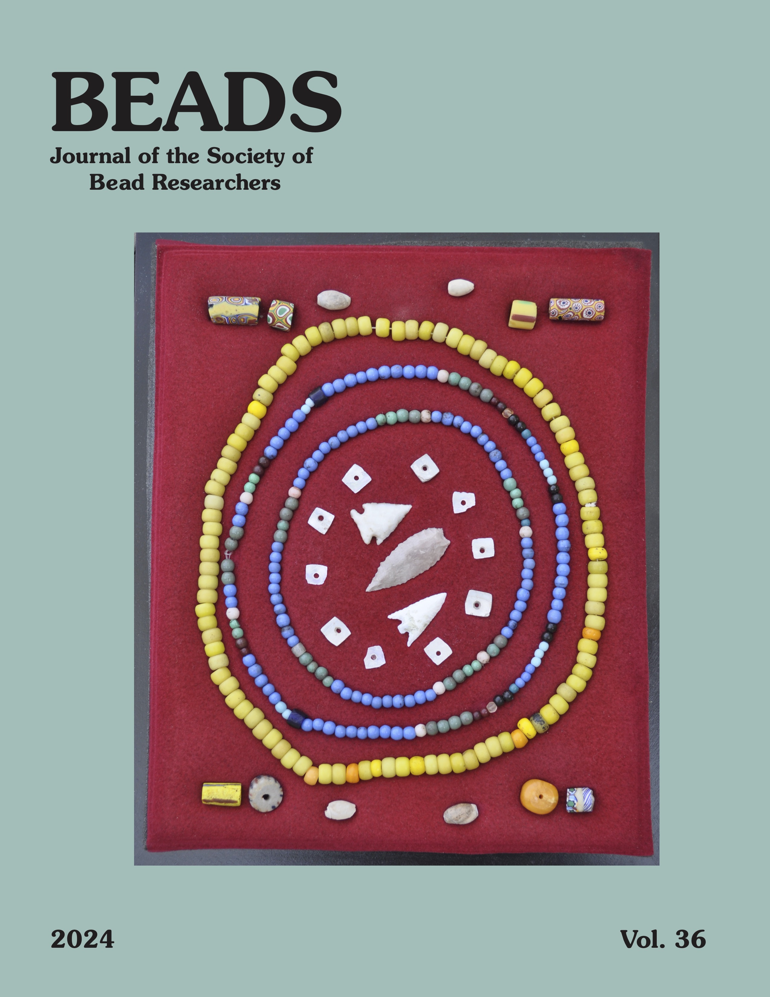 Cover of Volume 36 (2024) of BEADS: Journal of the Society of Bead Researchers. Features glass beads on a red background.